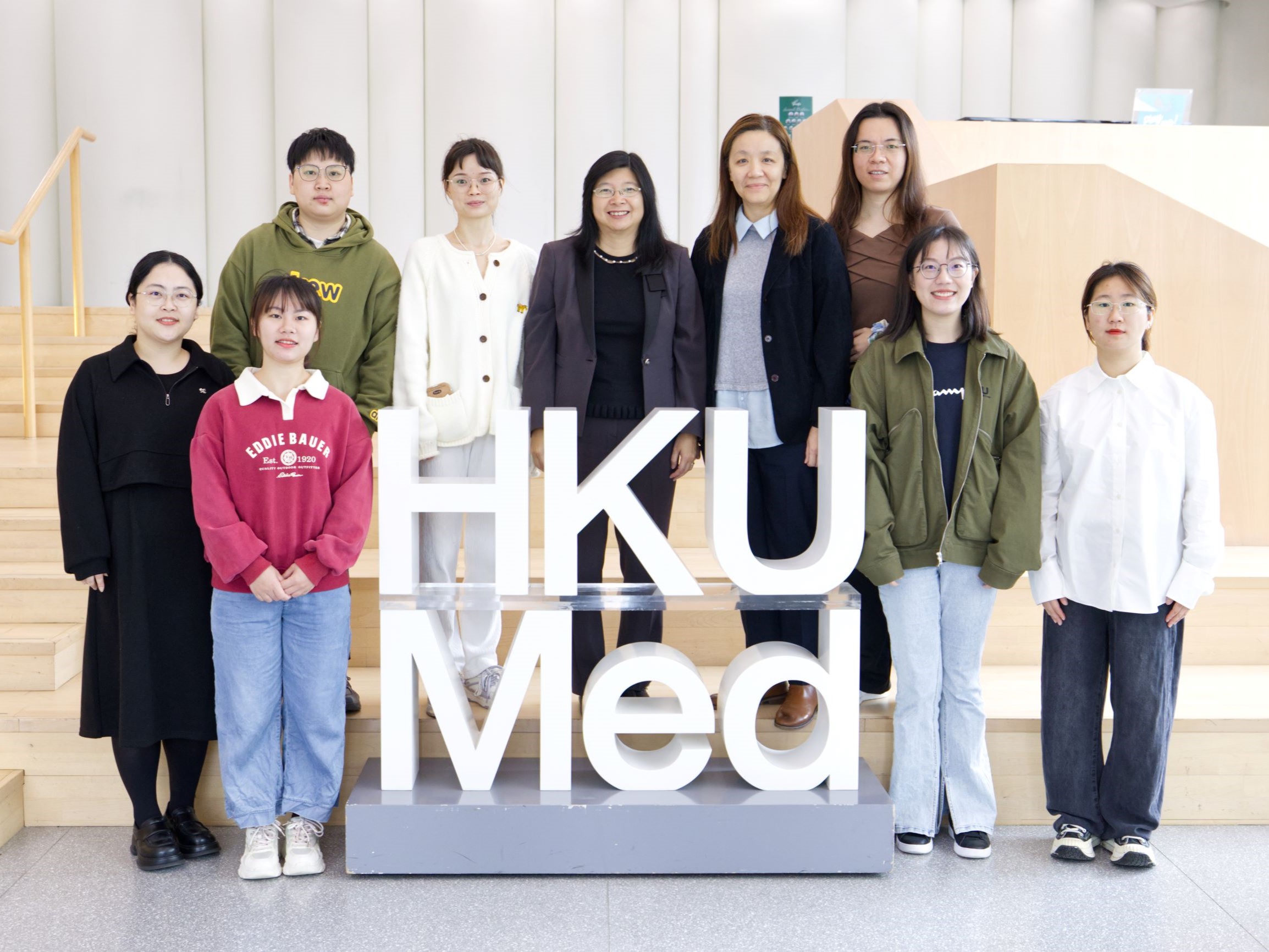 Prof Clara Lau and her research team Prof Clara Lau and her research team